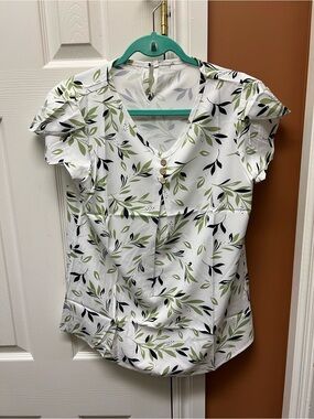 White Leaf-Print V-Neck Blouse with Green Accents